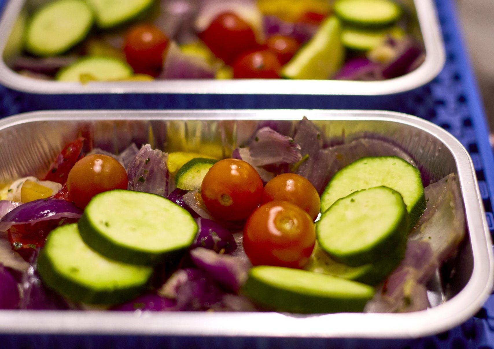 Close up of trays of prepared vegetables