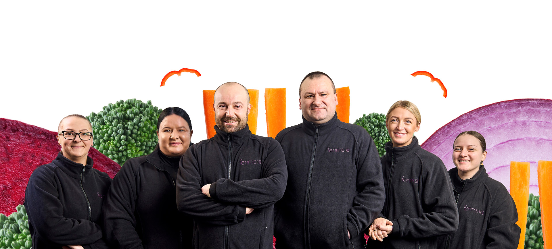 A group of six fenmarc workers smiling at the camera