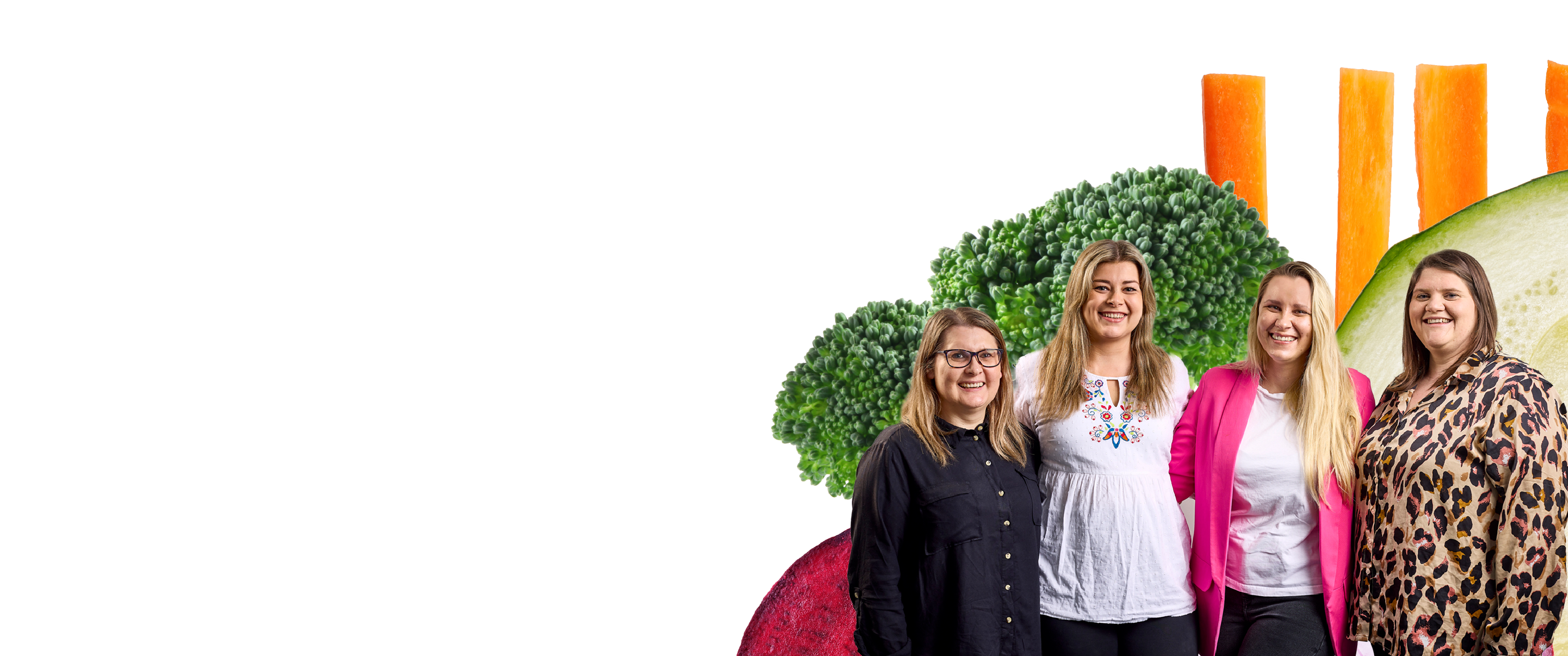 Four ladies from fenmarc smiling at the camera